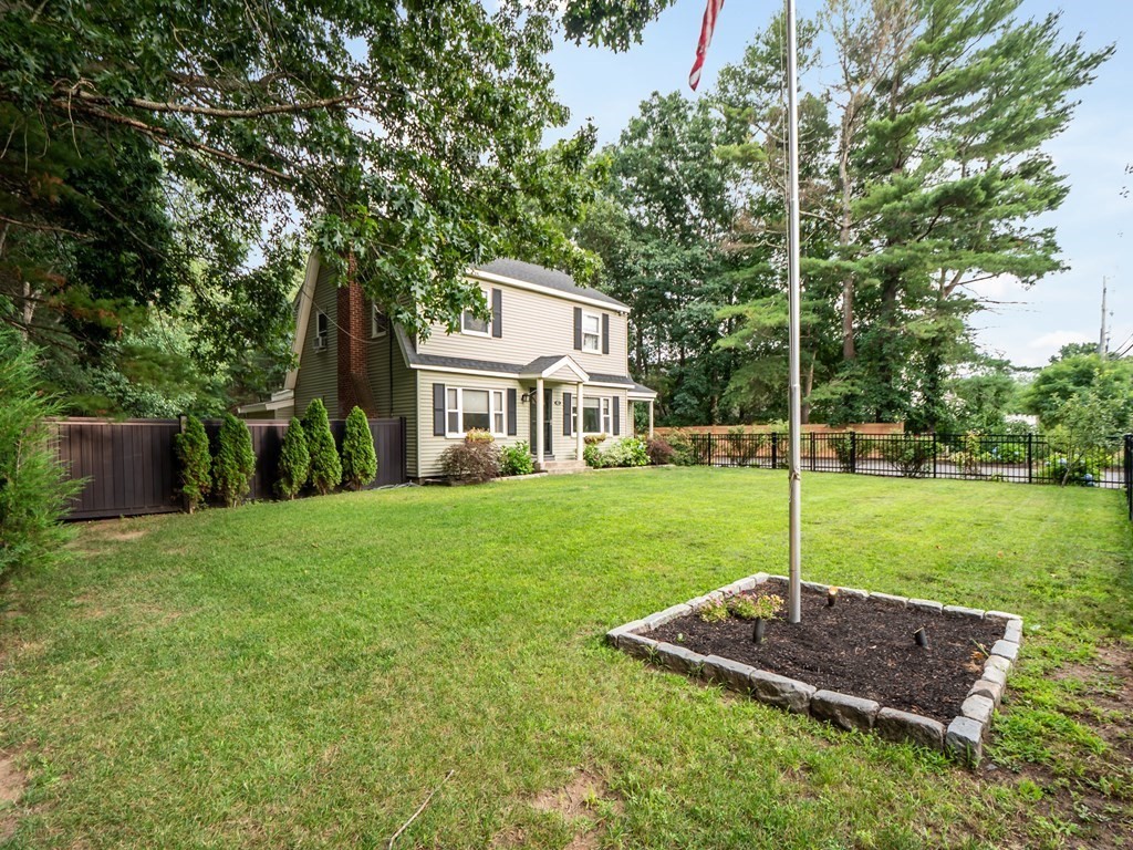 82 Rangeway Road Billerica, MA 01862 - Photo 3 of 40 a view of a house with backyard and trees