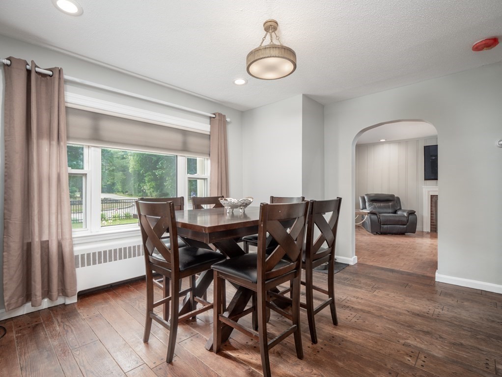 82 Rangeway Road Billerica, MA 01862 - Photo 31 of 40 a view of a dining room with furniture window and wooden floor