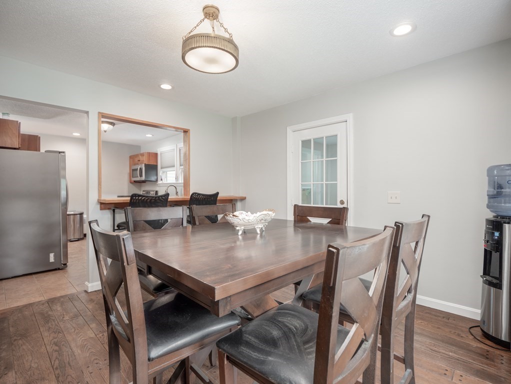 82 Rangeway Road Billerica, MA 01862 - Photo 32 of 40 a view of a dining room with furniture