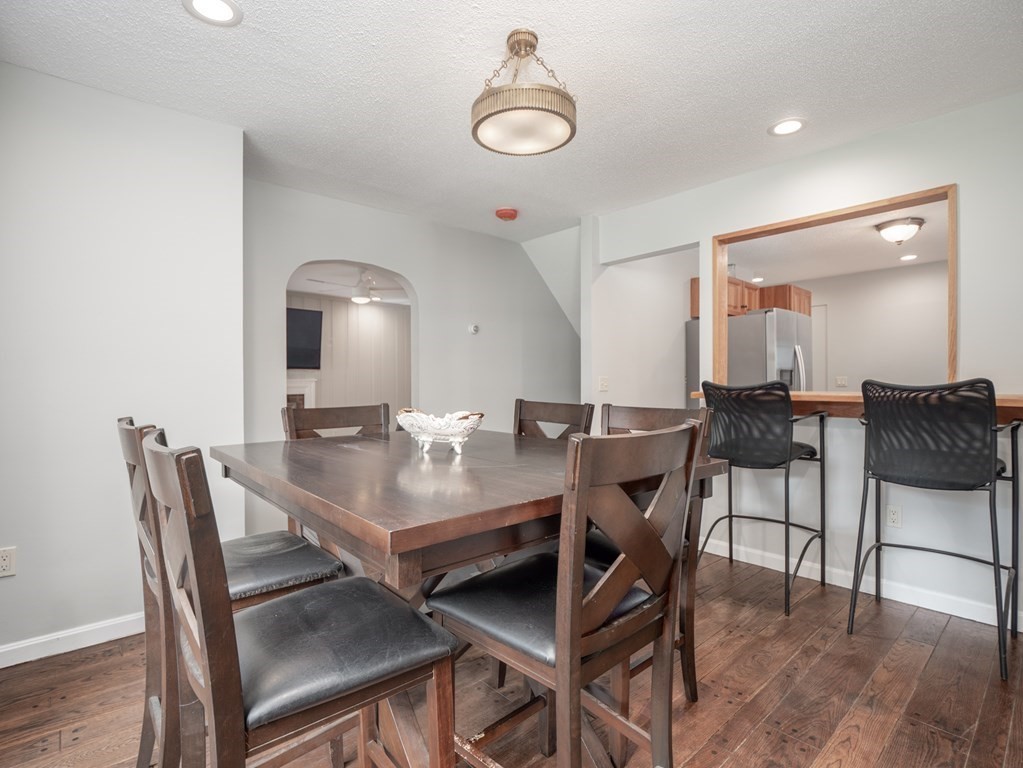 82 Rangeway Road Billerica, MA 01862 - Photo 33 of 40 a view of a dining room with furniture and wooden floor