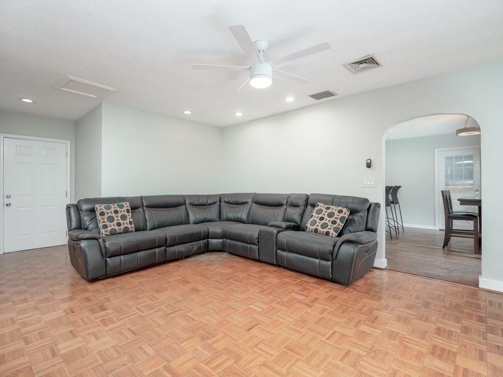 82 Rangeway Road Billerica, MA 01862 - Photo 36 of 40 a living room with a couch and a view of kitchen