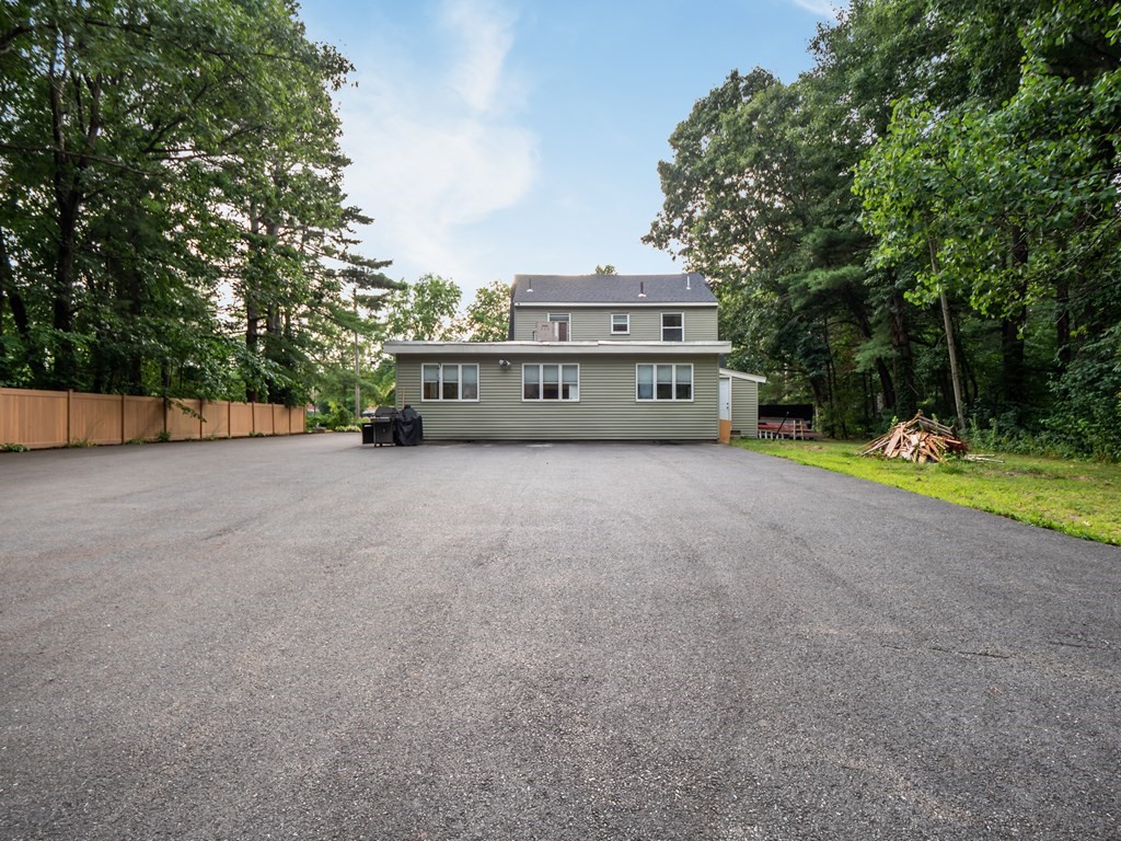 82 Rangeway Road Billerica, MA 01862 - Photo 39 of 40 a view of a house with outdoor space and sitting area