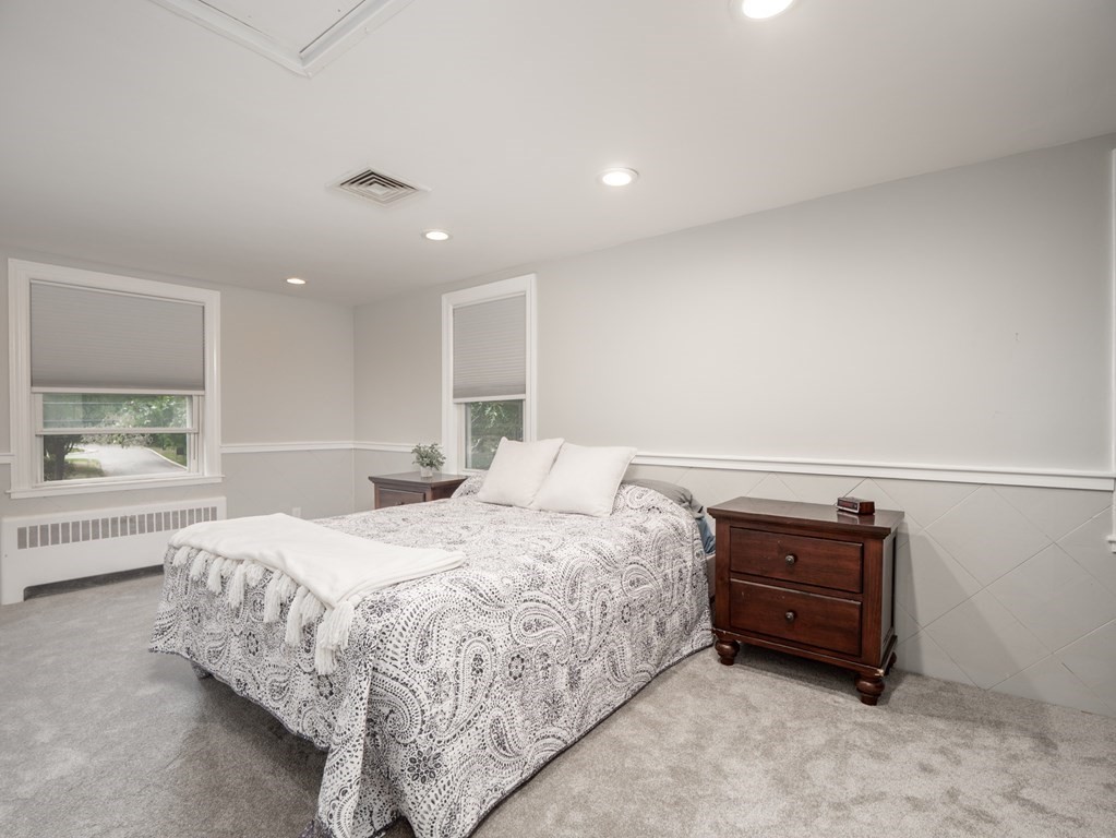 82 Rangeway Road Billerica, MA 01862 - Photo 9 of 40 a bedroom with a bed and a window