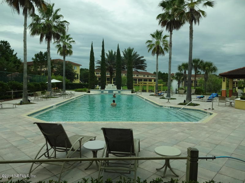 9745 Touchton Road, Unit 2028 Jacksonville, FL 32246 - Photo 17 of 20 a view of outdoor space with palm trees
