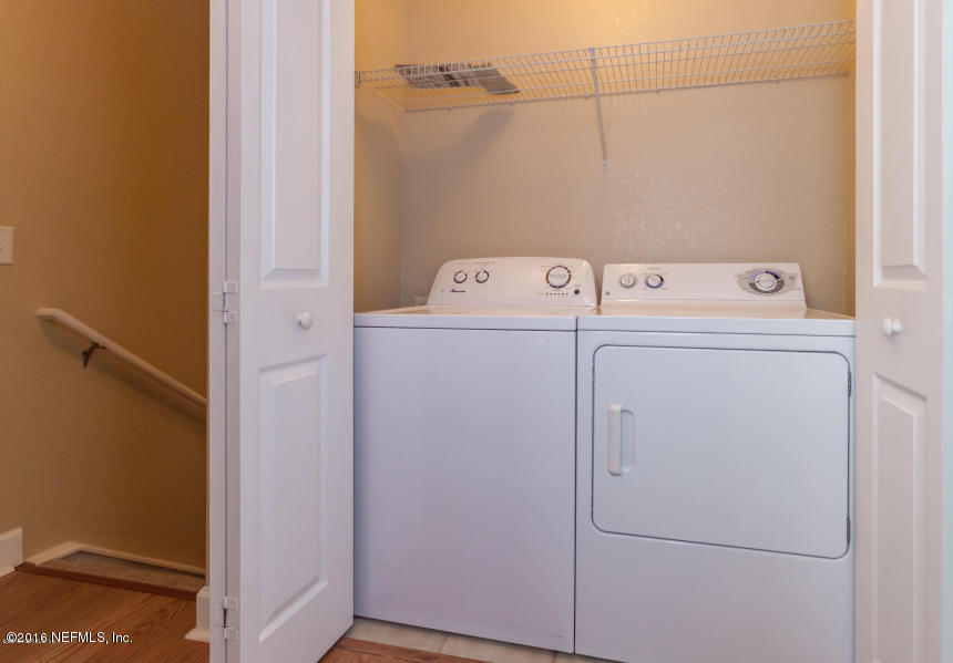 9745 Touchton Road, Unit 2028 Jacksonville, FL 32246 - Photo 8 of 20 a utility room with dryer and washer