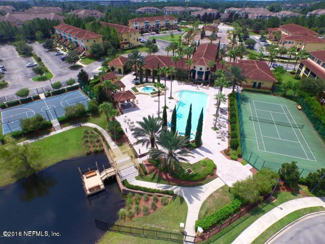 9745 Touchton Road, Unit 2028 Jacksonville, FL 32246 - Photo 10 of 20 an aerial view of residential houses with outdoor space and lake view