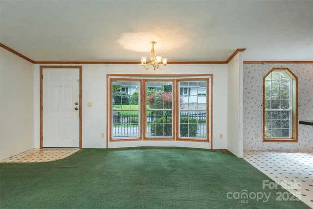 a kitchen with stainless steel appliances granite countertop a stove and a sink