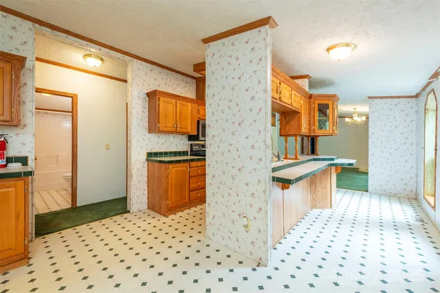 a bathroom with a shower and a mirror