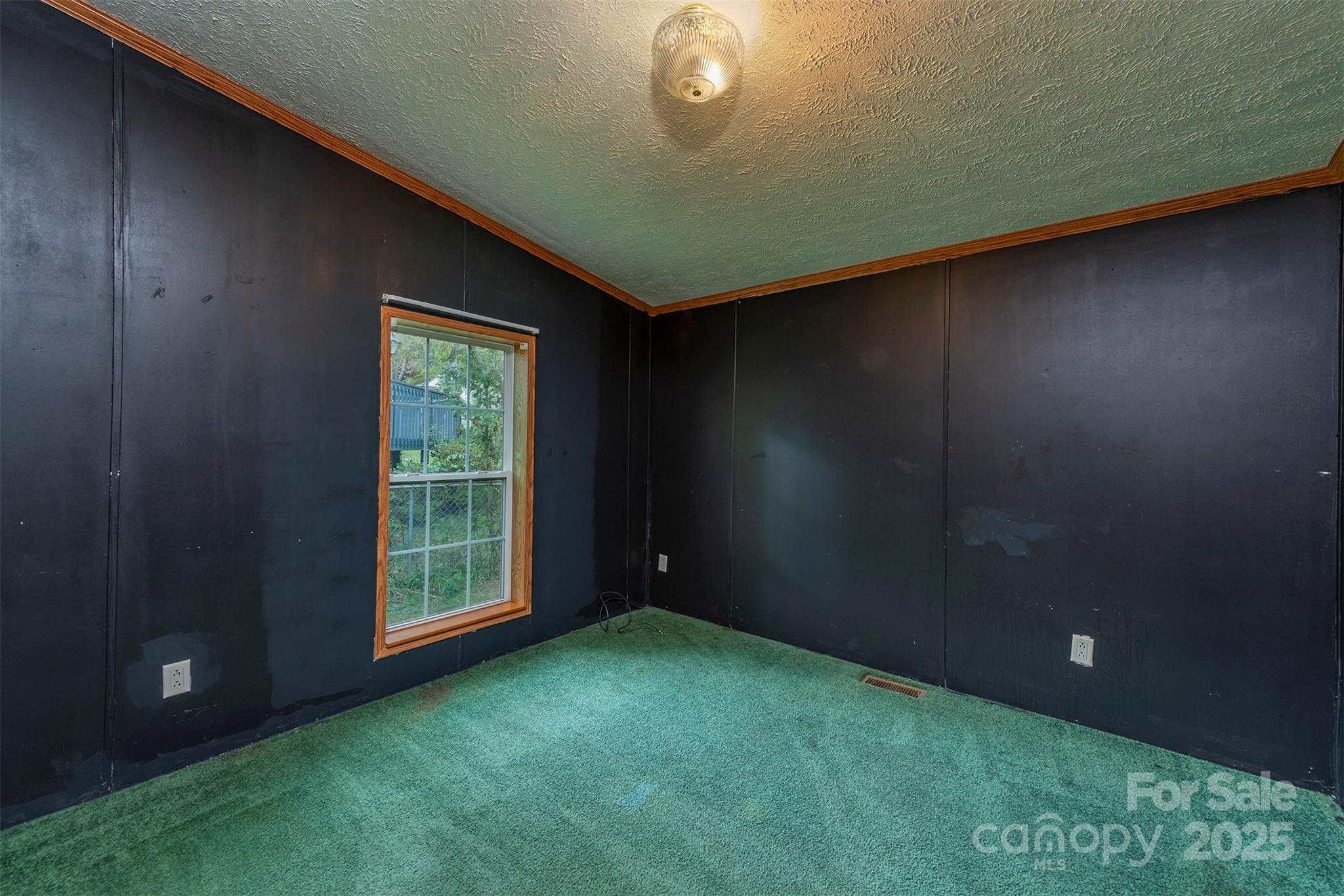 103 Sixth Street, Unit ~7&9 Black Mountain, NC 28711 - Photo 28 of 37 a view of an empty room with a window