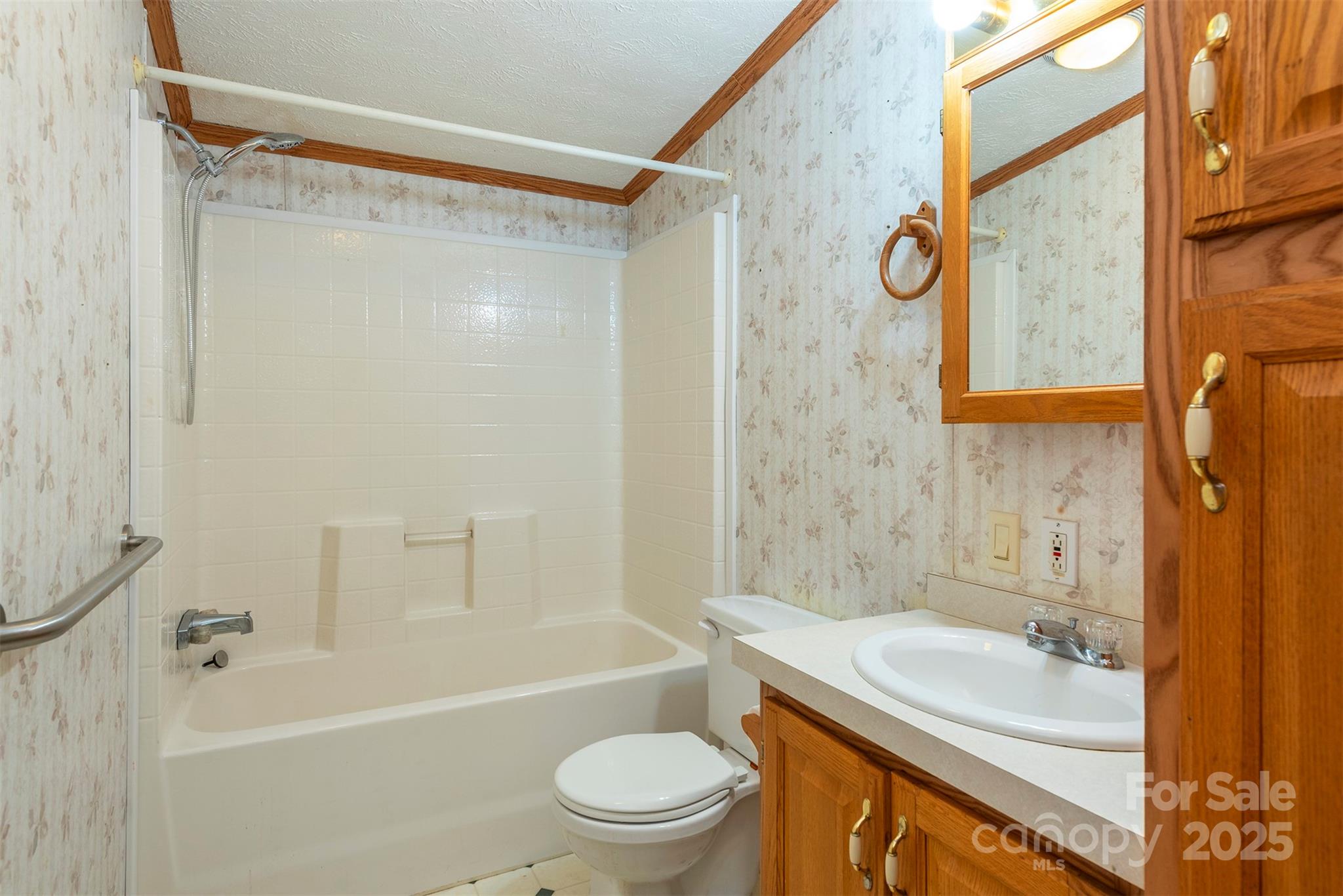 103 Sixth Street, Unit ~7&9 Black Mountain, NC 28711 - Photo 30 of 37 a bathroom with a sink toilet and shower