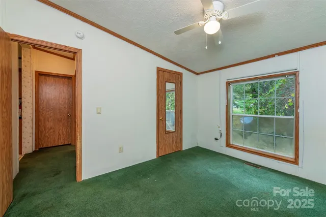 a view of a balcony with wooden floor
