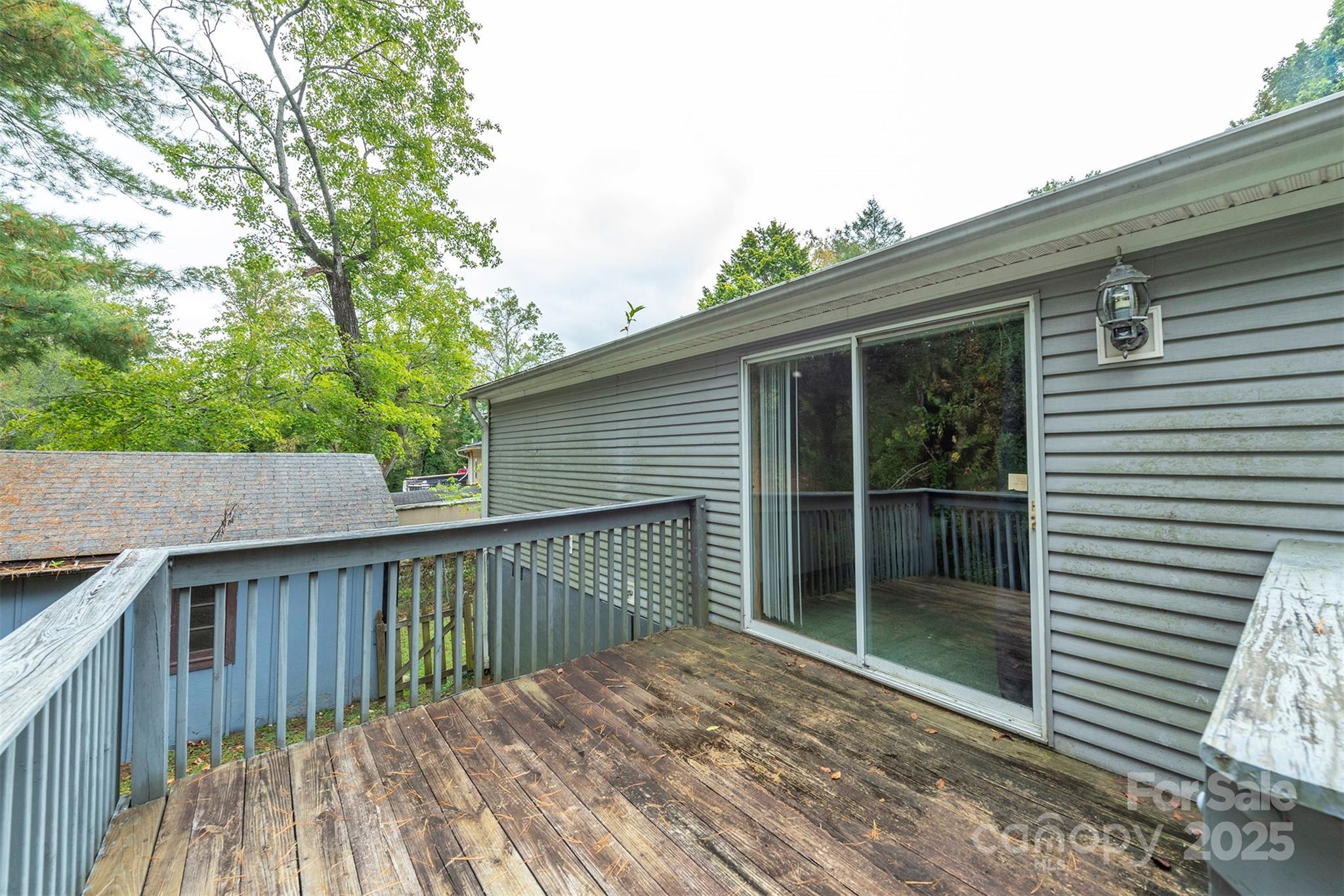 103 Sixth Street, Unit ~7&9 Black Mountain, NC 28711 - Photo 36 of 37 a balcony with view of the house