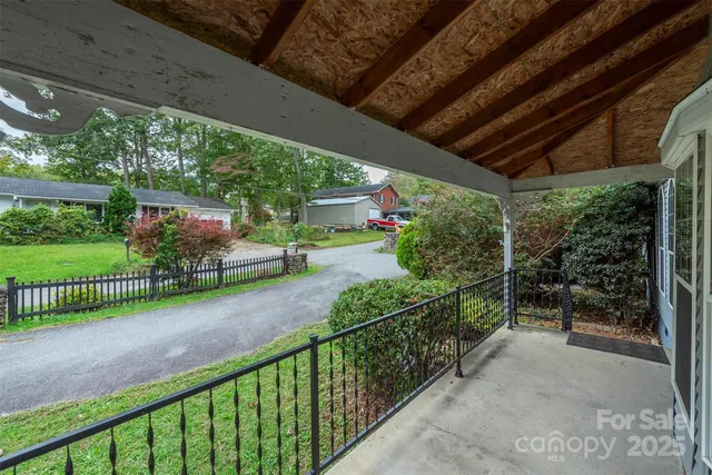 a view of a porch and garden