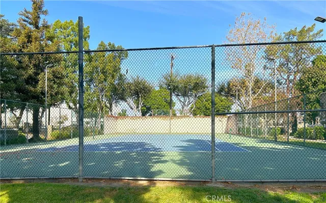 a view of a swimming pool with a balcony