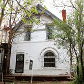 a front view of a house with yard