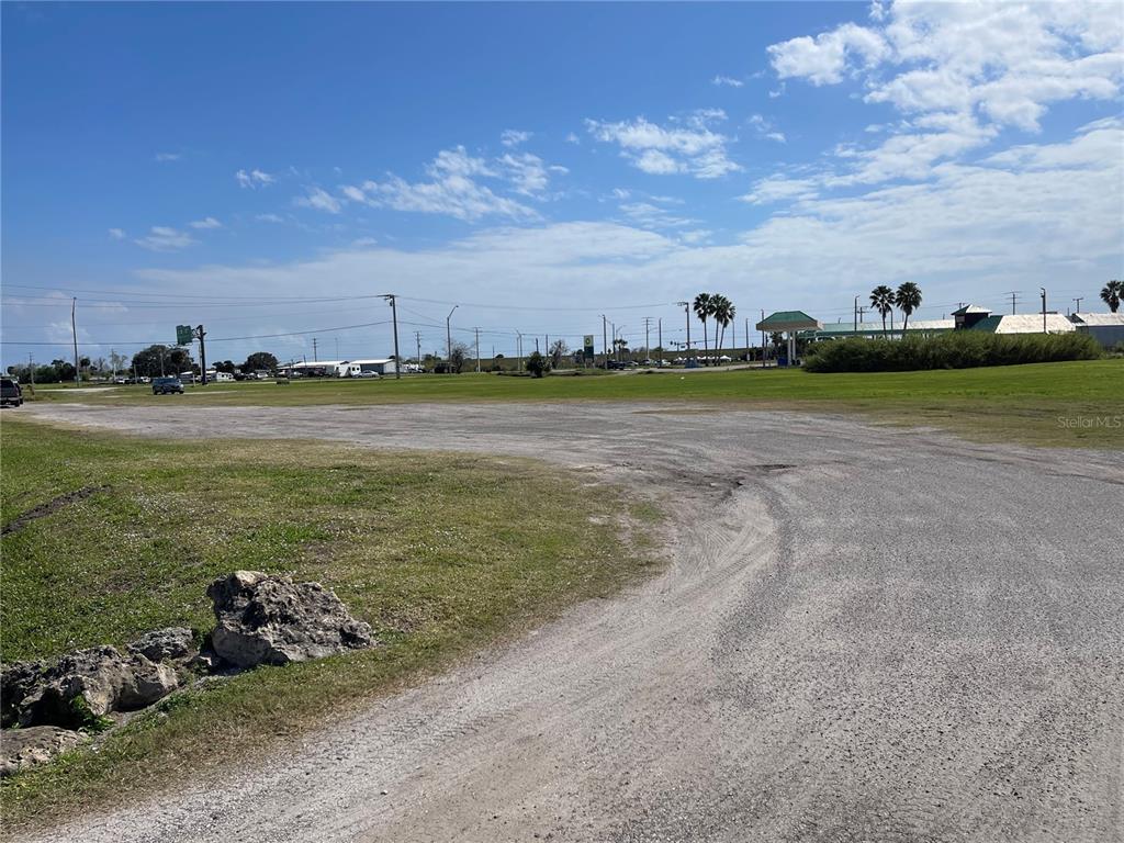 a view of a lake and yard