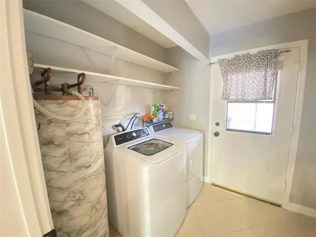 a view of kitchen and utility room