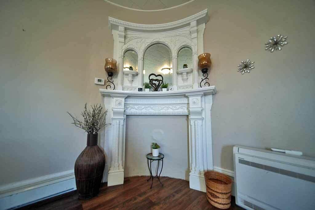 103 Springfield Road Danforth, ME 04424 - Photo 45 of 96 me-home-curved-fireplace