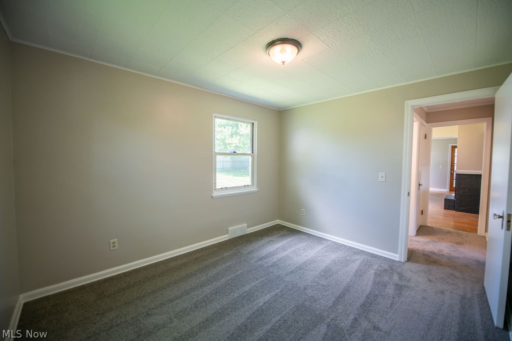 4221 2nd Street Northwest Canton, OH 44708 - Photo 14 of 35 Main-level bedroom