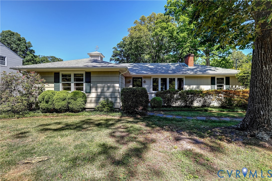 1817 Pocoshock Boulevard North Chesterfield, VA 23235 - Photo 1 of 41 a view of a house with a yard plants and large tree