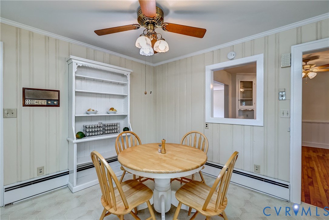 1817 Pocoshock Boulevard North Chesterfield, VA 23235 - Photo 20 of 41 a view of a dining room with furniture and chandelier