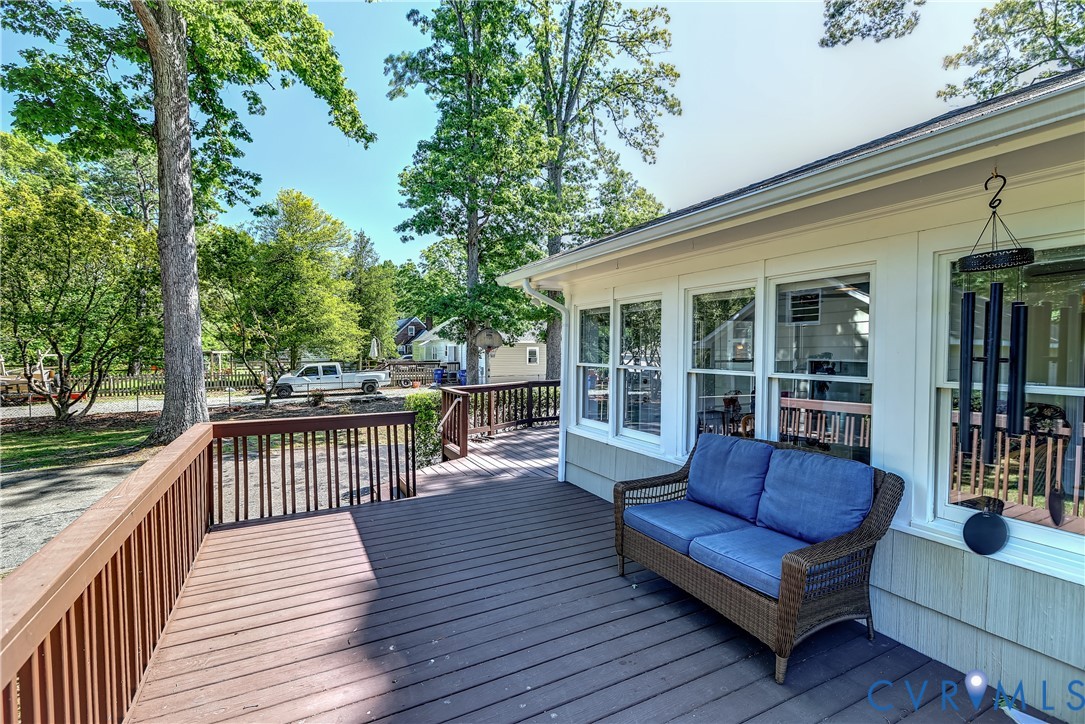 1817 Pocoshock Boulevard North Chesterfield, VA 23235 - Photo 31 of 41 a view of a house with wooden deck and furniture