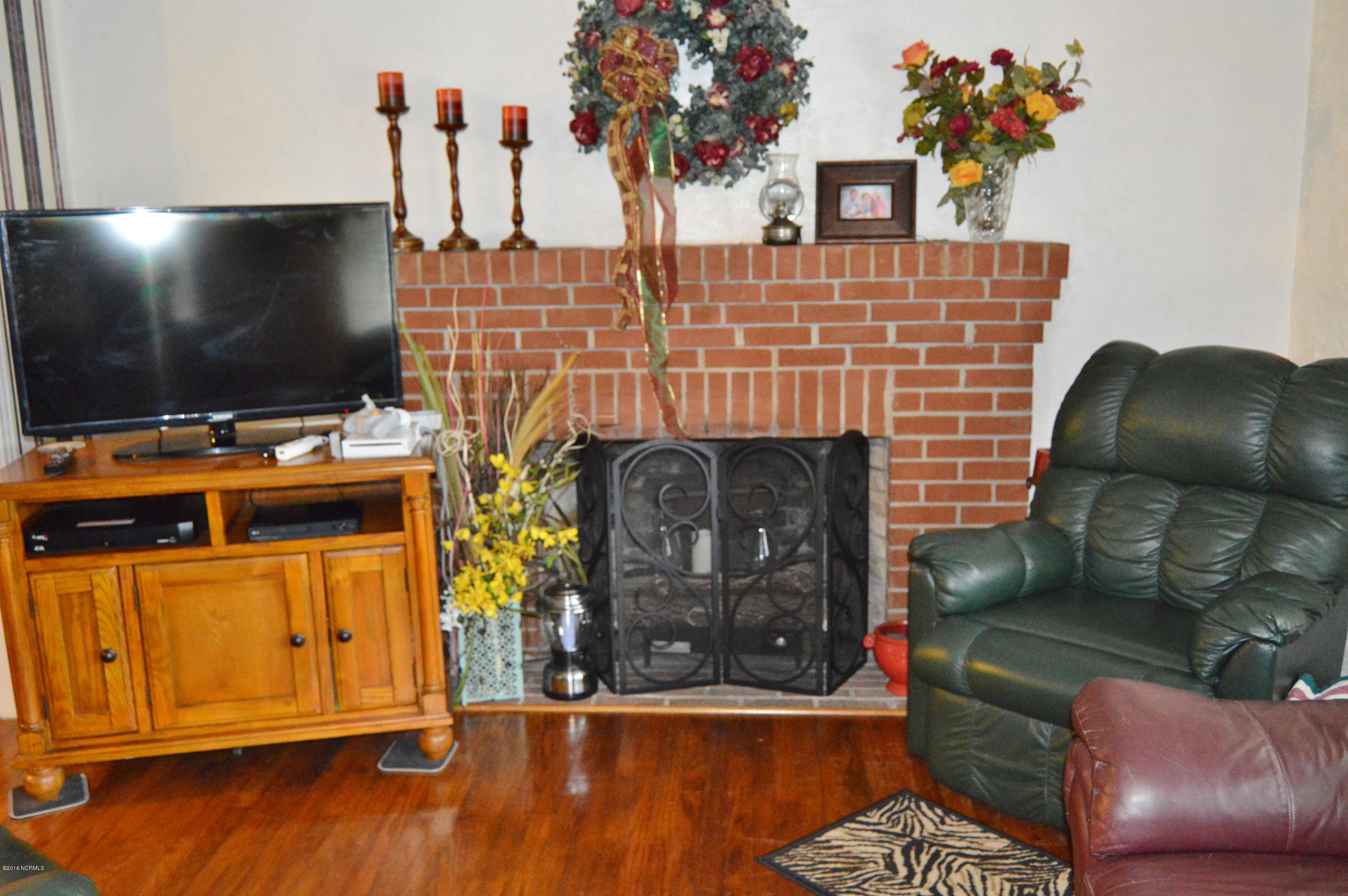 4830 Englishtown Road Willard, NC 28478 - Photo 8 of 28 fireplace