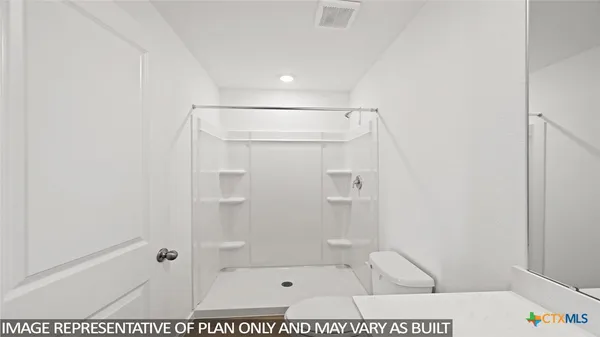 a view of small space with racks on the wall