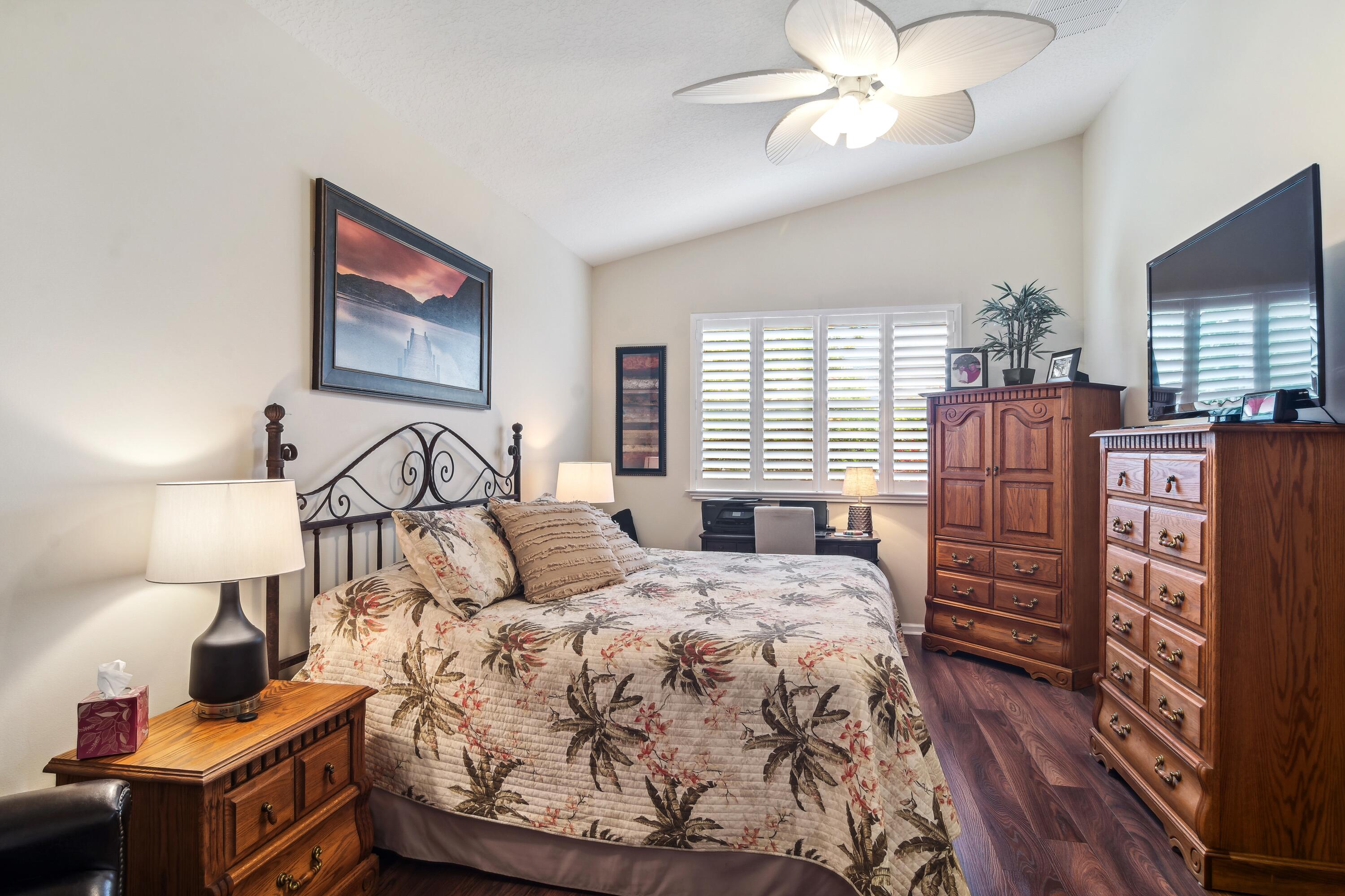 313 Springview Loop Port St. Lucie, FL 34986 - Photo 13 of 54 14_313NWSpringviewLoop_14_PrimaryBedroom