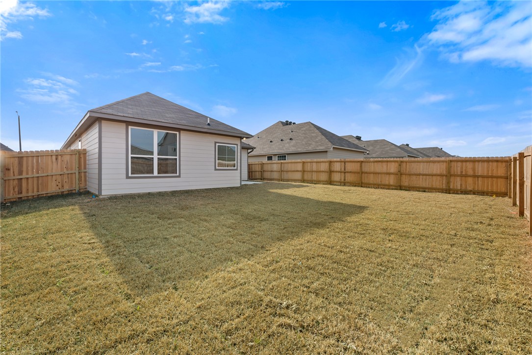 2412 Rooke Road Bryan, TX 77807 - Photo 35 of 35 a view of a house with a yard