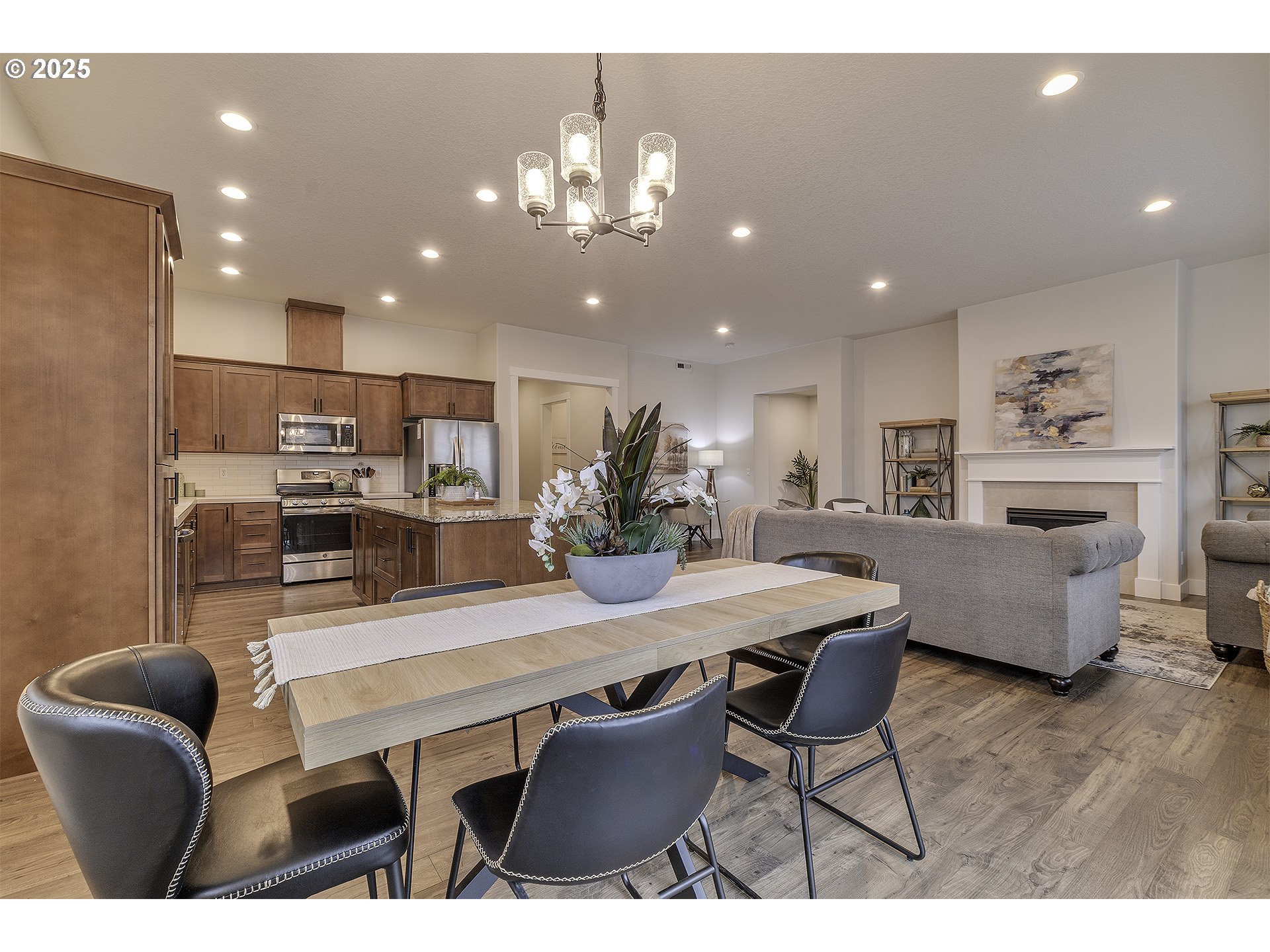29068 Northwest Fair Street North Plains, OR 97133 - Photo 14 of 29 a view of a dining room with furniture and wooden floor
