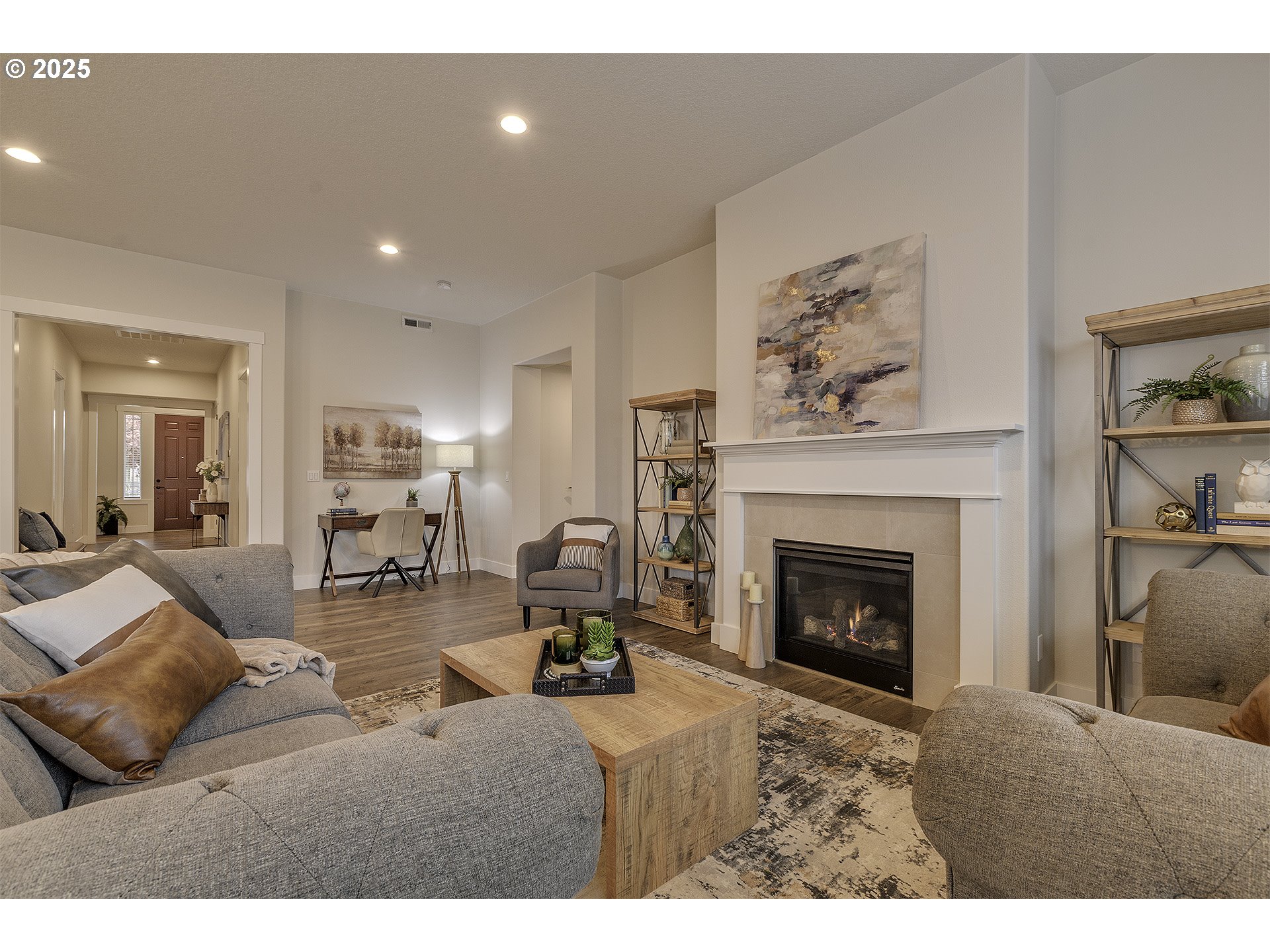 29068 Northwest Fair Street North Plains, OR 97133 - Photo 15 of 29 a living room with furniture a fireplace and a painting