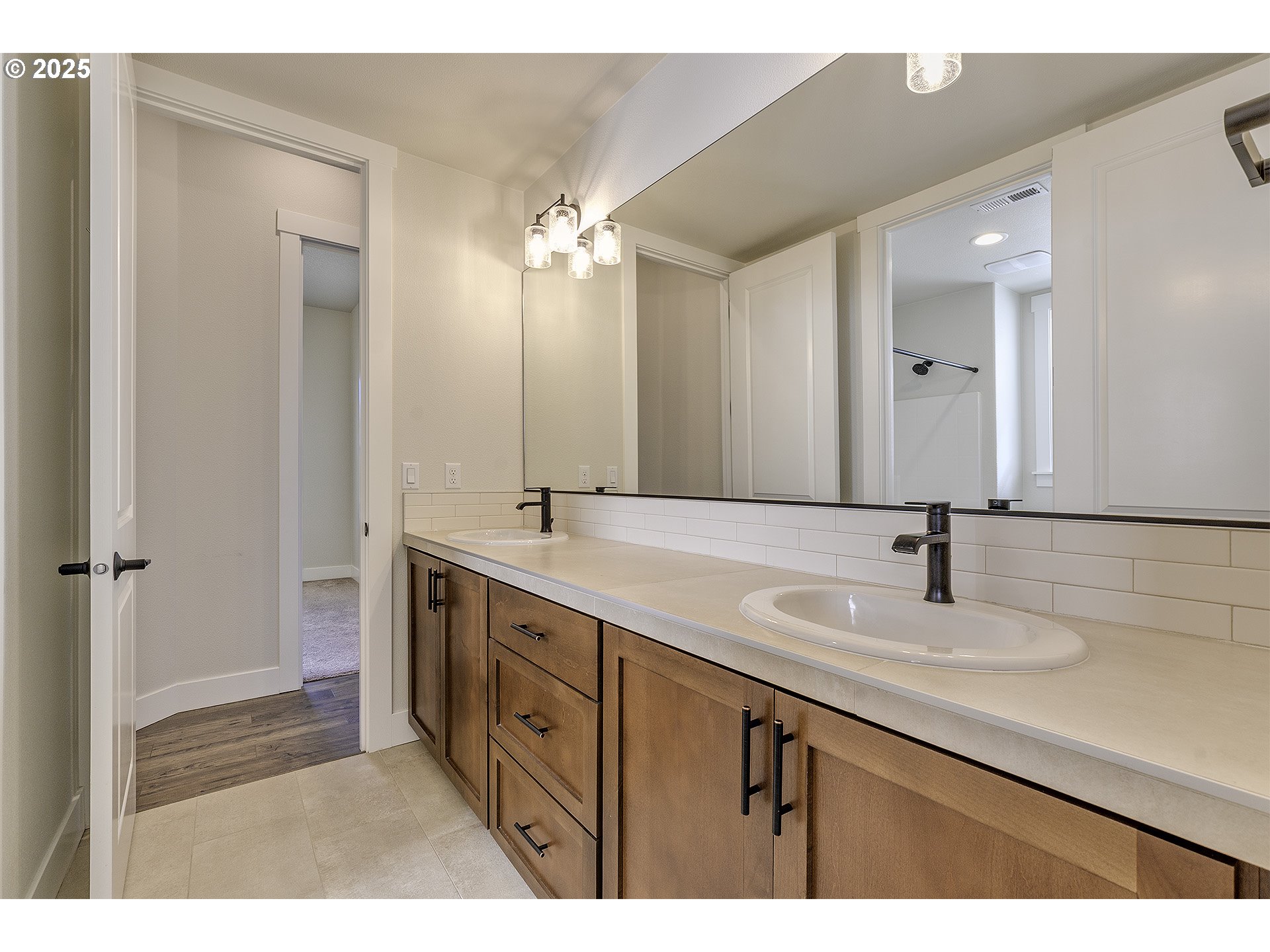 29068 Northwest Fair Street North Plains, OR 97133 - Photo 24 of 29 a bathroom with a double vanity sink mirror and