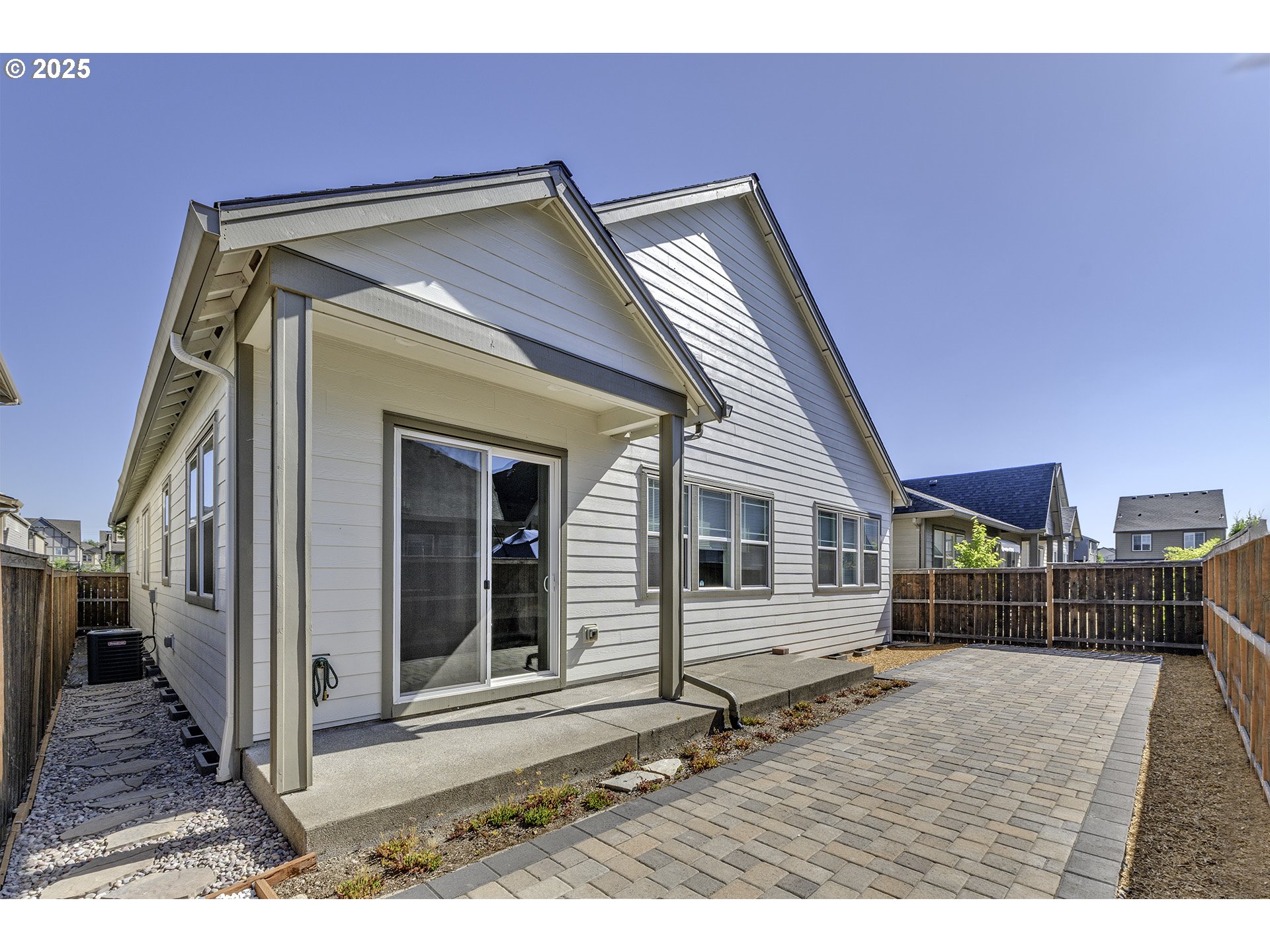29068 Northwest Fair Street North Plains, OR 97133 - Photo 26 of 29 a backyard of a house with barbeque oven table and chairs