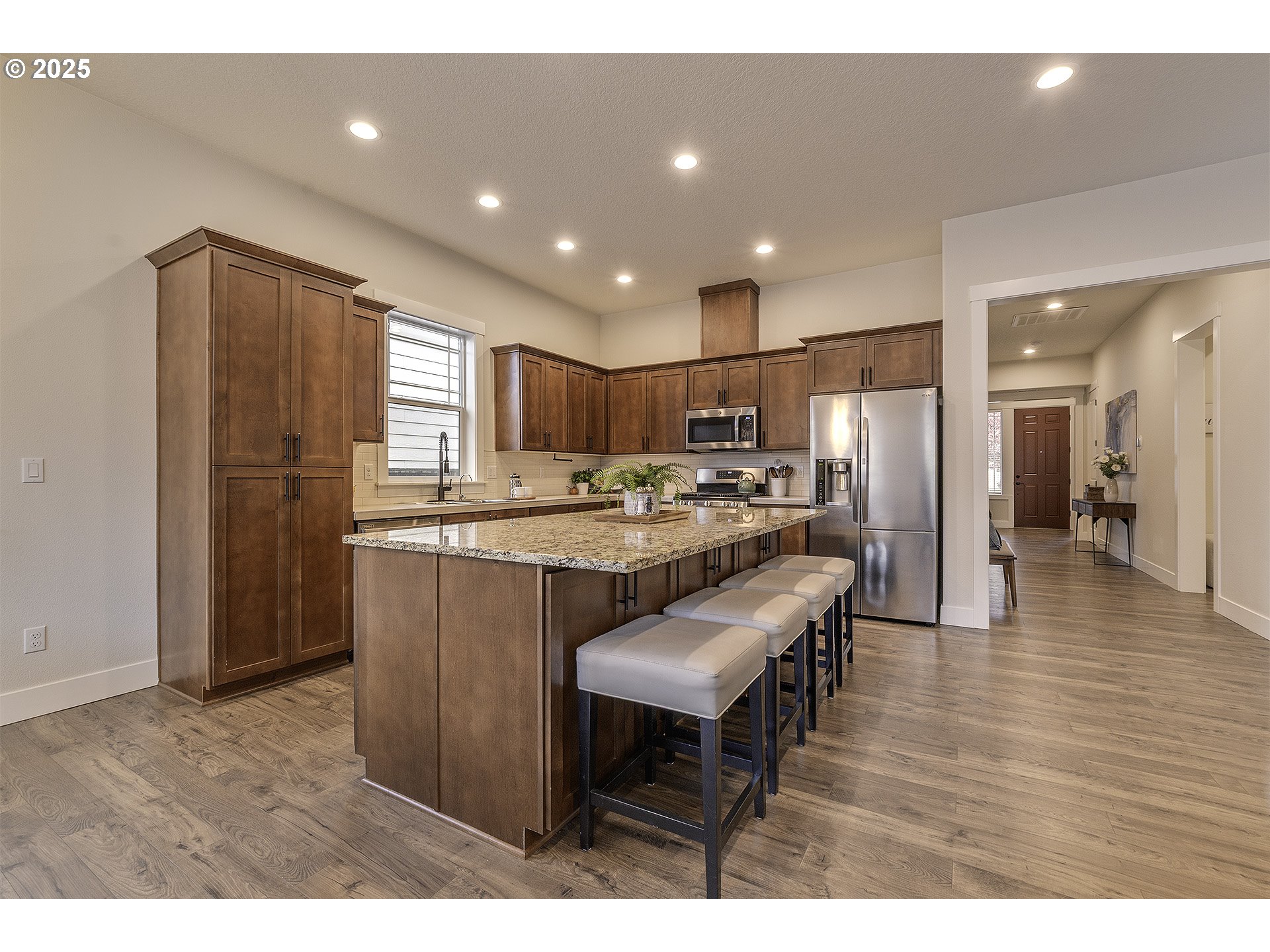 29068 Northwest Fair Street North Plains, OR 97133 - Photo 10 of 29 a kitchen with refrigerator and a sink