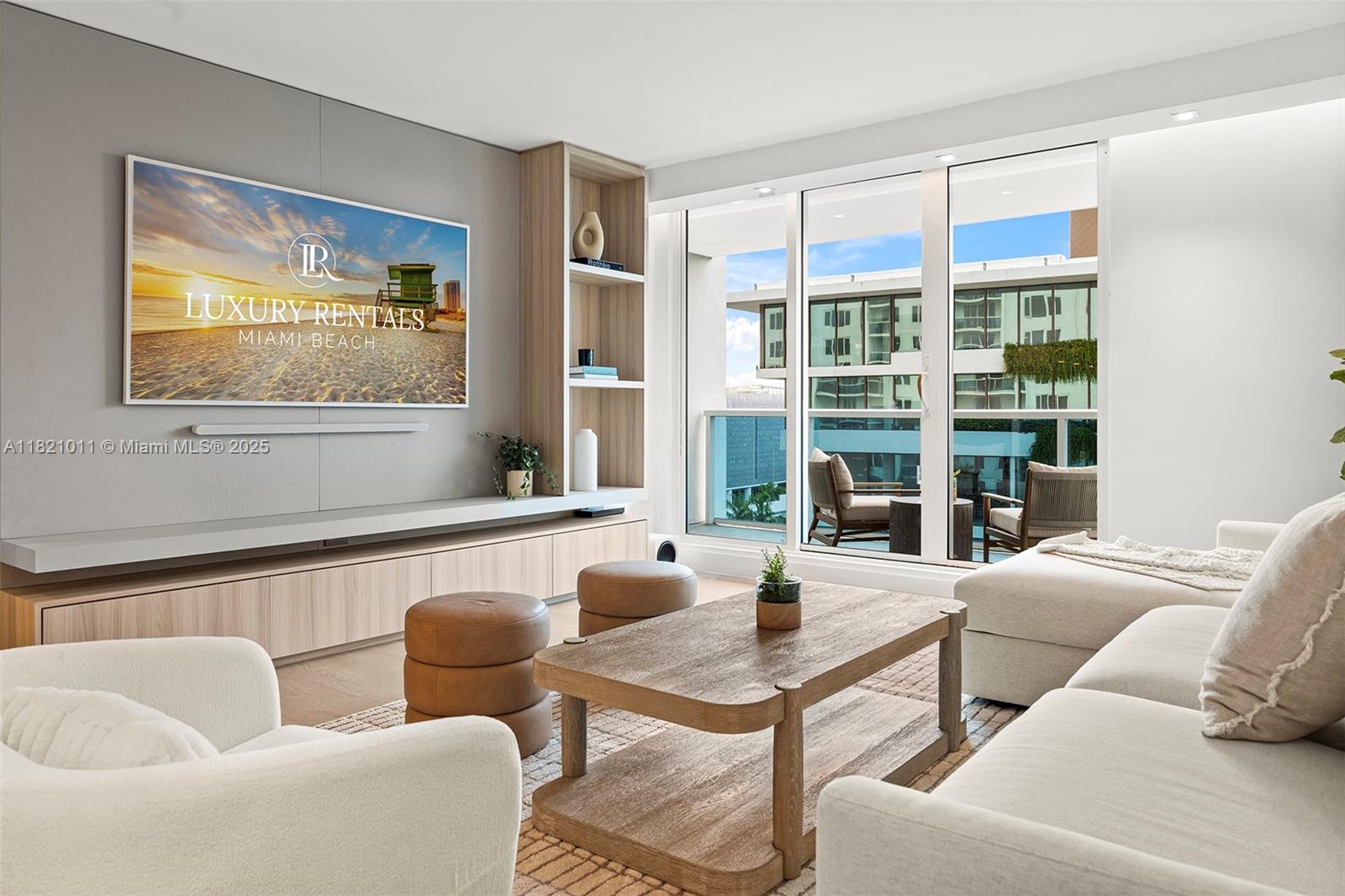 2301 Collins Avenue, Unit 630 Miami Beach, FL 33139 - Photo 1 of 48 a living room with furniture and a window