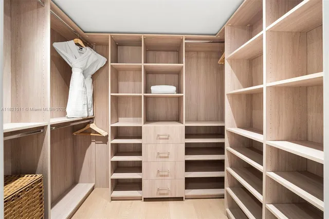 a view of an empty walk in closet