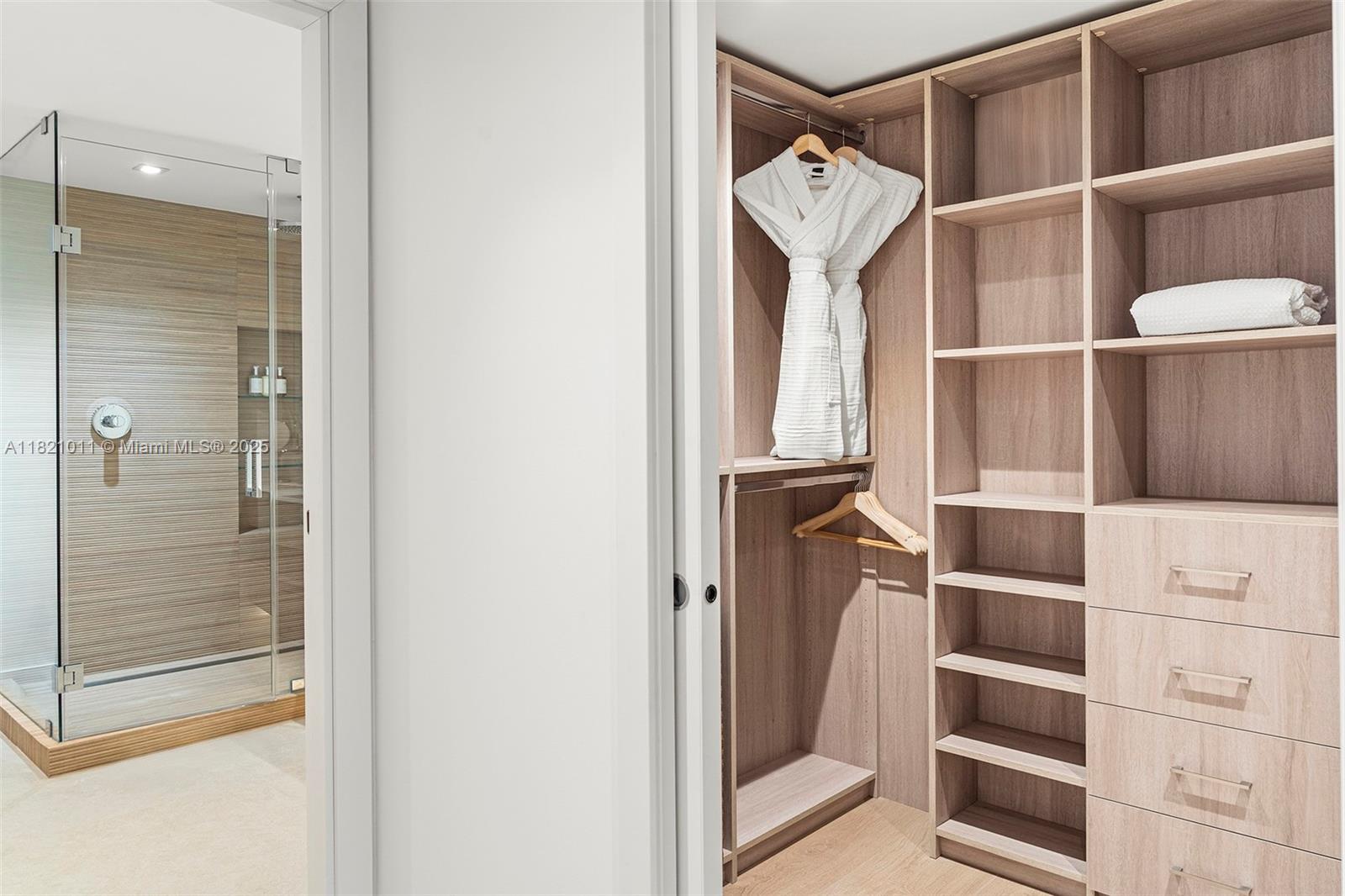2301 Collins Avenue, Unit 630 Miami Beach, FL 33139 - Photo 21 of 48 a view of walk in closet with empty racks