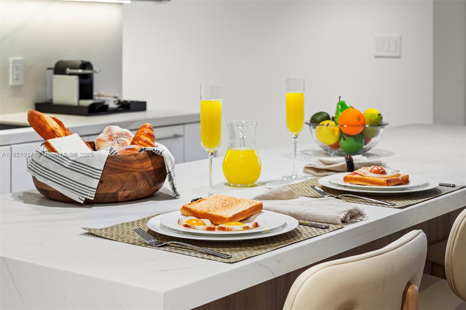 2301 Collins Avenue, Unit 630 Miami Beach, FL 33139 - Photo 35 of 48 a bathroom with a sink and a mirror