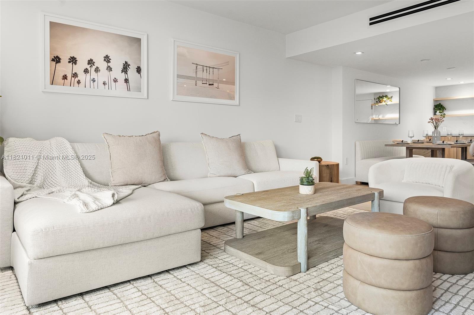 2301 Collins Avenue, Unit 630 Miami Beach, FL 33139 - Photo 42 of 48 a living room with furniture and a table