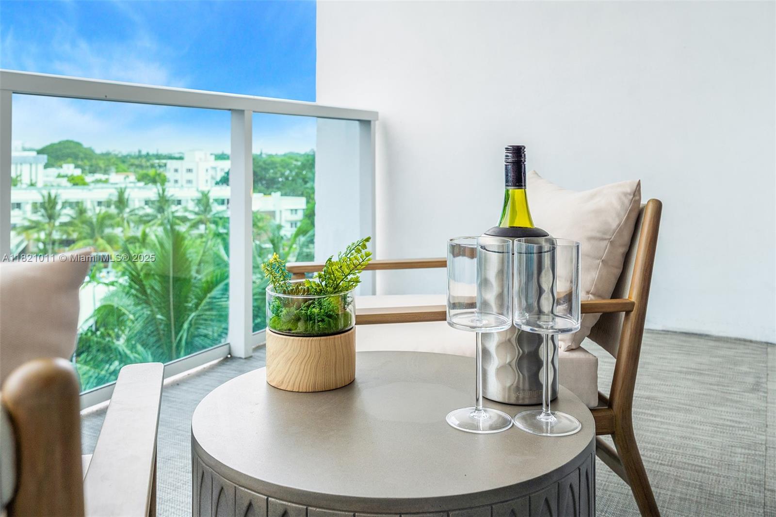 2301 Collins Avenue, Unit 630 Miami Beach, FL 33139 - Photo 44 of 48 a view of a dining room with furniture window and wooden floor