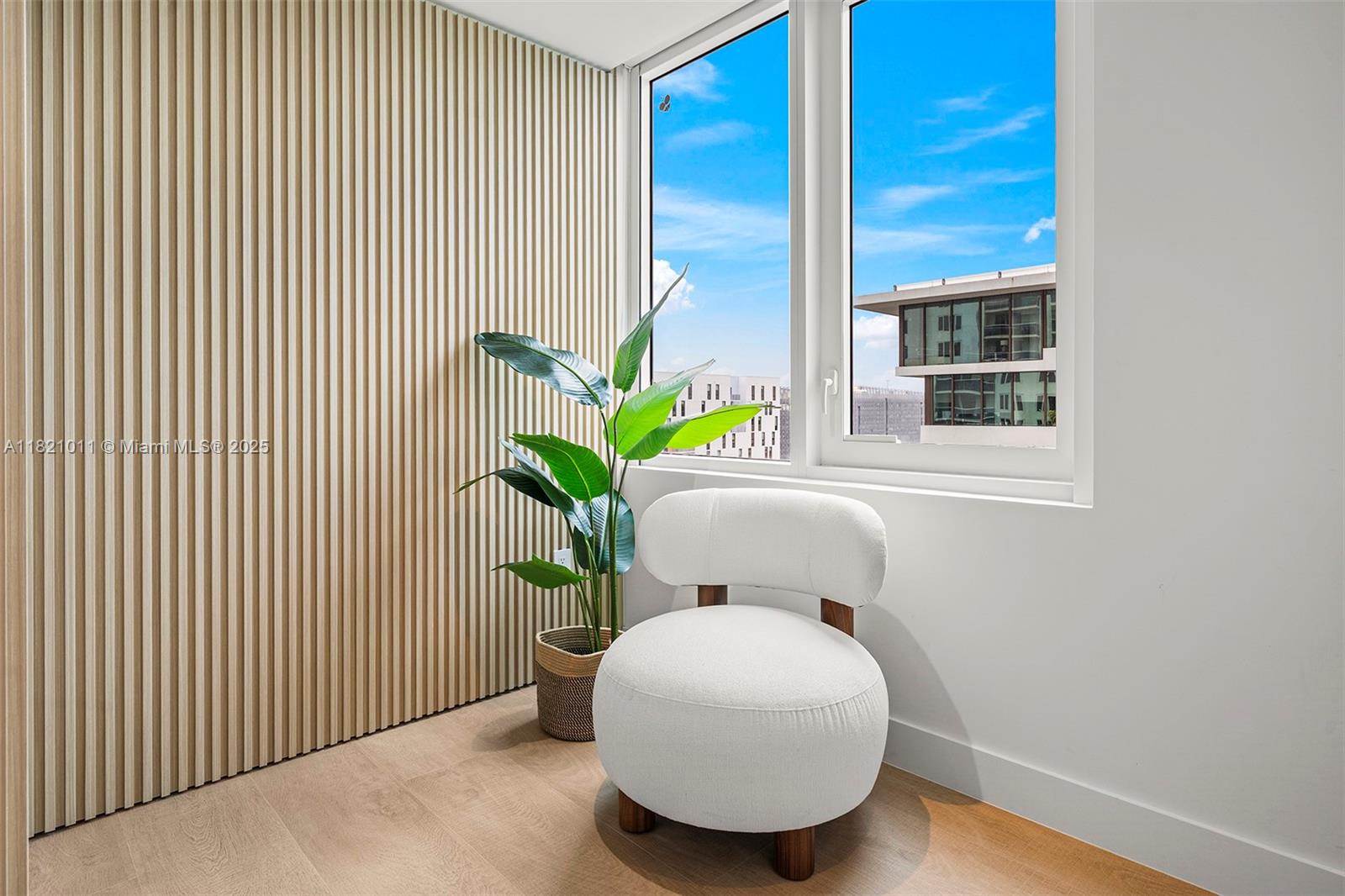 2301 Collins Avenue, Unit 630 Miami Beach, FL 33139 - Photo 9 of 48 a potted plant sitting in front of a door