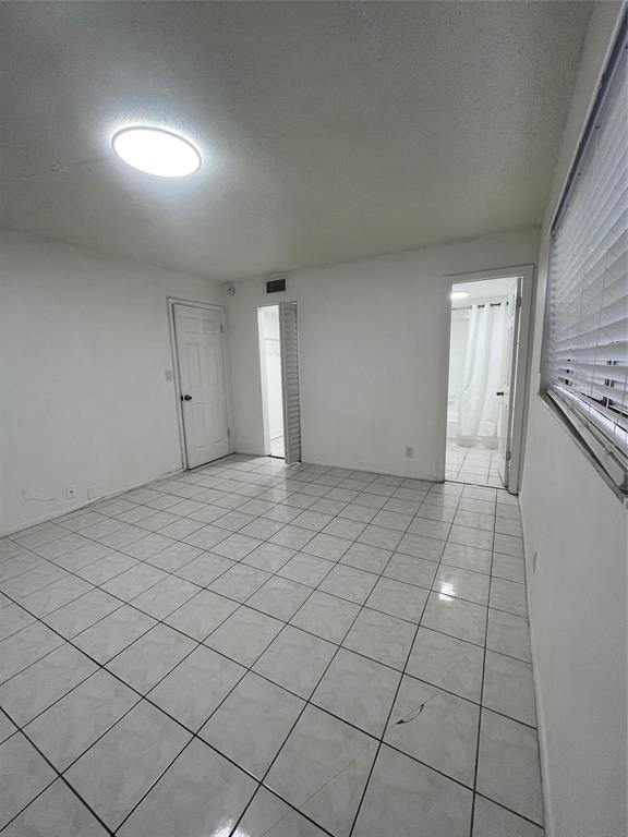 7925 Fairview Drive, Unit 101 Tamarac, FL 33321 - Photo 15 of 48 a view of an empty room and window