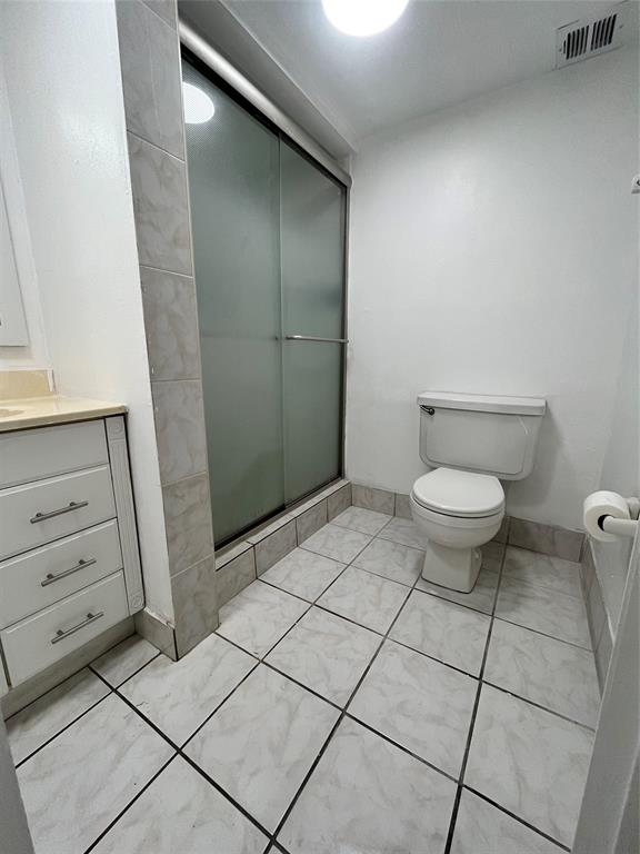 7925 Fairview Drive, Unit 101 Tamarac, FL 33321 - Photo 25 of 48 a bathroom with a sink and a toilet