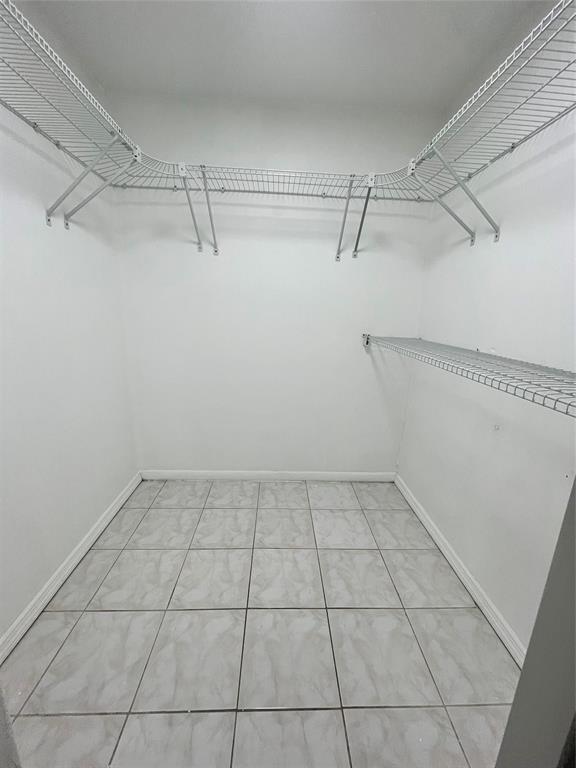 7925 Fairview Drive, Unit 101 Tamarac, FL 33321 - Photo 26 of 48 a view of a room with an empty racks