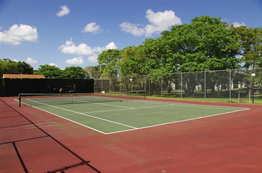 7925 Fairview Drive, Unit 101 Tamarac, FL 33321 - Photo 41 of 48 a view of tennis court