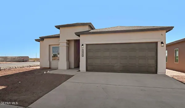 a view of a house with a garage