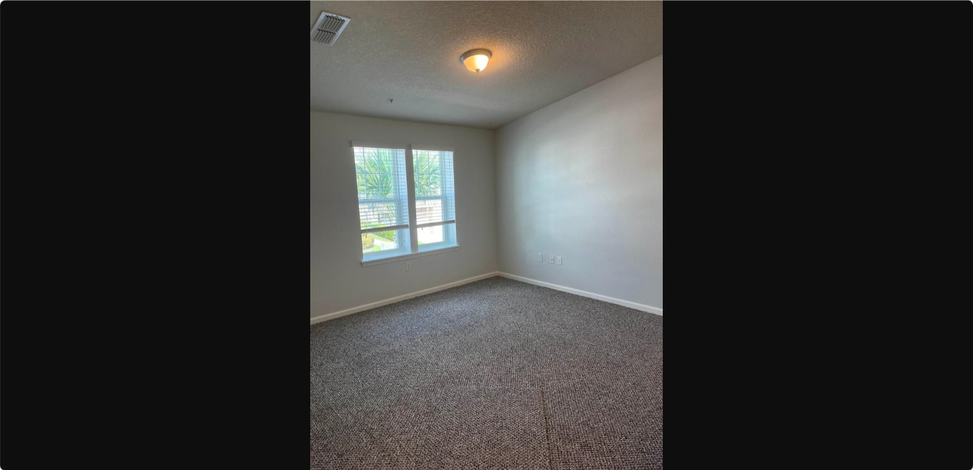 1513 Golden Lake Loop St. Augustine, FL 32084 - Photo 12 of 17 a view of an empty room with a window