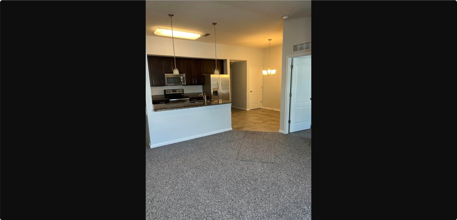 1513 Golden Lake Loop St. Augustine, FL 32084 - Photo 13 of 17 a view of a kitchen and a sink