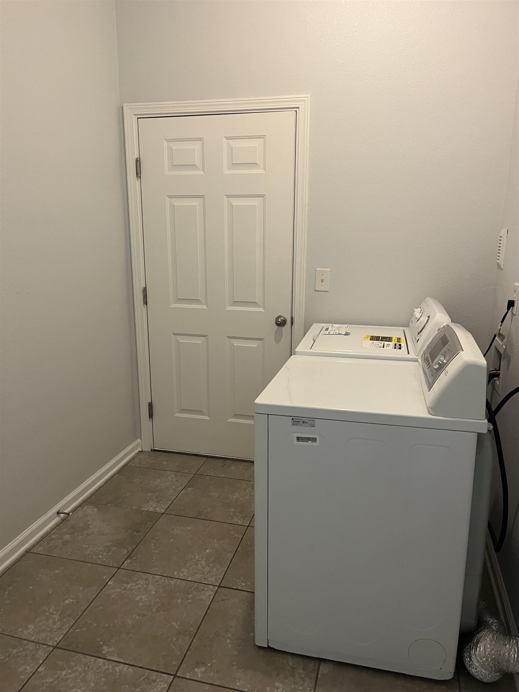 1513 Golden Lake Loop St. Augustine, FL 32084 - Photo 17 of 17 a utility room with dryer and washer